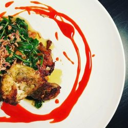 Knife & Nettles Catering - Roasted Chicken Thighs/ Sauteed Spinach/ Crispy Shallots/ Red Pepper Coulis