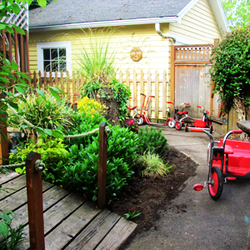In a Child's Path - Our bike path features a garden with many local plants!