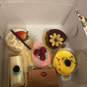 Tiny Pyramid - Banana Haupia, raspberry, Chocolate, lychee and lime, Tiramisu, Lilikoi Cheesecake - Cafes Near Me - Honolulu, Hawaii