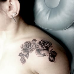 Evil by Needle Tattoo & Piercing