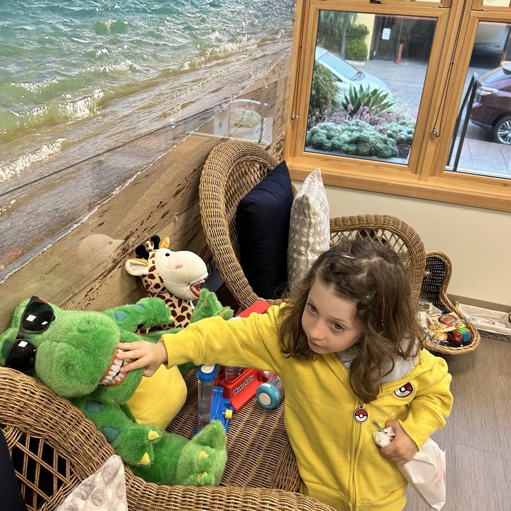 Aloha Pediatric Dentistry - Picking out prizes and playing with the office alligator!! - Pediatric Dentists Near Me - Orinda, California Aloha Pediatric Dentistry - Picking out prizes and playing with the office alligator!! - Pediatric Dentists Near Me - Orinda, California