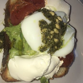 Chicago Waffles - The avocado toast came with a generous heaping of avocado, and a poached egg! Ordered mine without the watercress salad. - Breakfast & Brunch Near Me - Chicago, Illinois