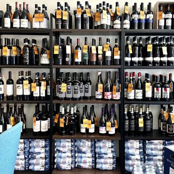 Sottovoce Cafe - a wall of wine bottles - Coffee & Tea Near Me - Palm Desert, California Sottovoce Cafe - a wall of wine bottles - Coffee & Tea Near Me - Palm Desert, California