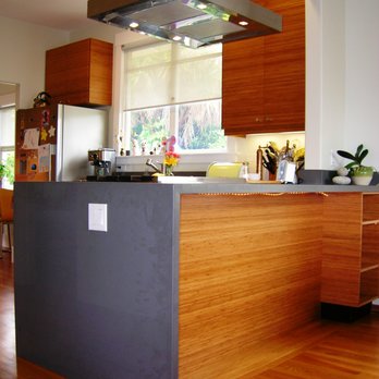 T&G Construction - a modern kitchen with wood floors - General Contractors Near Me T&G Construction - a modern kitchen with wood floors - General Contractors Near Me