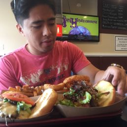 BBQ burger, mushroom burger, garlic Parmesan fries, and onion rings BBQ burger, mushroom burger, garlic Parmesan fries, and onion rings