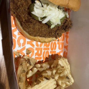 Old North State Food Hall - Spicy chicken sandwich and half eaten waffle fries - Food Court Near Me - Selma, North Carolina Old North State Food Hall - Spicy chicken sandwich and half eaten waffle fries - Food Court Near Me - Selma, North Carolina