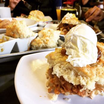 Biscuit Head - Fried chick biscuit in the front, gravy trio middle, brisket biscuit back right. Delish - Bakeries Near Me - Asheville, North Carolina
