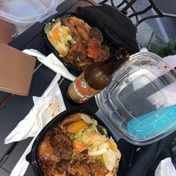 Calabash - In the back: jerk chicken with rice veggies plantains; in front: oxtails with same sides. HEAVEN