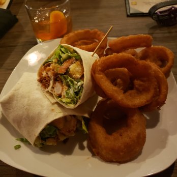 Nautilus Milford - Chicken Caesar salad wrap and onion rings - Bars Near Me - Milford, Connecticut Nautilus Milford - Chicken Caesar salad wrap and onion rings - Bars Near Me - Milford, Connecticut