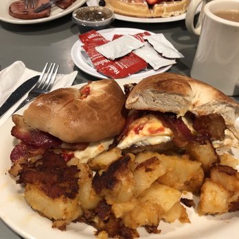 Nick's Deli & Restaurant - Sausage egg n cheese on a Bagel with home fries. - Delis Near Me - Revere, Massachusetts Nick's Deli & Restaurant - Sausage egg n cheese on a Bagel with home fries. - Delis Near Me - Revere, Massachusetts