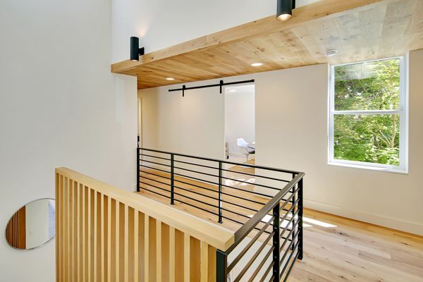 Photo of Greenhome Solutions - Seattle, WA, US. Tesoro Woods White Oak Flooring in "Straw" on floor and ceiling. Design/built by NW Built; Photo by Tucker English.