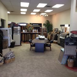 Premier Flooring Solutions - Showroom with a large selection of flooring
