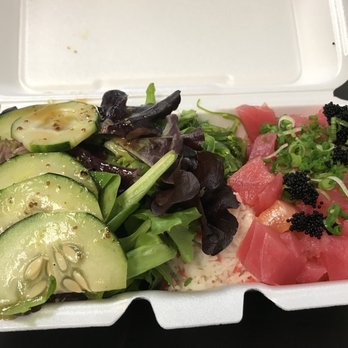 Poke District - Cucumber salad, tuna/salmon combo. All served with seaweed salad and krab. - Seafood Near Me - Orange, California