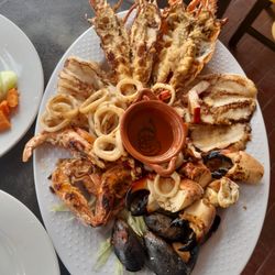 Calypso's - Our great Calypso's 7 seas platter for two persons.
Lobster- Shrimp-Octopus-Musseles- Fish- Stone crabs claws-Calamari rings, all grilled.