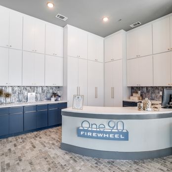 One90 Firewheel - The One90 Firewheel reception desk with blue and white cabinetry. - Apartments Near Me - Garland, Texas One90 Firewheel - The One90 Firewheel reception desk with blue and white cabinetry. - Apartments Near Me - Garland, Texas