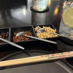 Po Thai Restaurant - Chopsticks, spices, peanuts, and sparkling water. Perfecto!