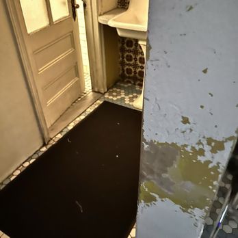 Coppelia - Entrance to bathroom - Cuban Near Me - New York, New York Coppelia - Entrance to bathroom - Cuban Near Me - New York, New York