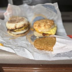 McDonald's - Sausage egg and cheese McMuffin, bacon egg and cheese biscuit and hash brown