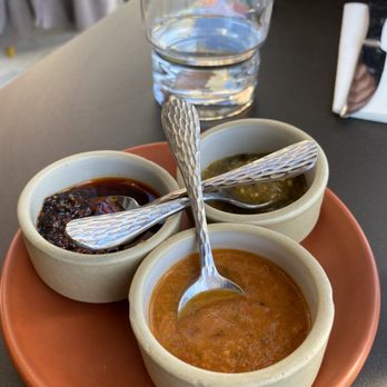 Conejo - Trio of salsas and oils.  The orange Salsa Roja was my favorite, but all are great!  [GF] - Mexican Near Me - Richmond, Virginia