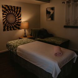 Wellness Body Care - Relaxing private room designed for our signature hypnosis and massage session, created to calm the mind and body.