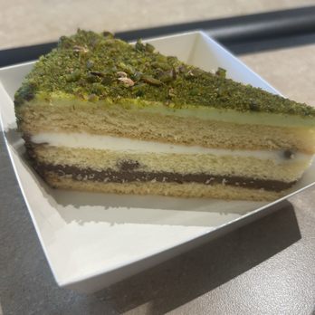 Camelia Cafe - Pistachio Cream Cake - Coffee & Tea Near Me - Des Peres, Missouri Camelia Cafe - Pistachio Cream Cake - Coffee & Tea Near Me - Des Peres, Missouri