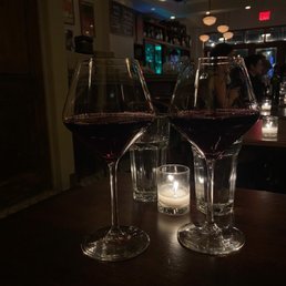 three glasses of wine on a table