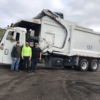 Dick's Disposal Services - Our founder Jack, with his two sons Marshall and Dennis. Standing in front of the "Mack Attack". - Recycling Center Near Me Dick's Disposal Services - Our founder Jack, with his two sons Marshall and Dennis. Standing in front of the "Mack Attack". - Recycling Center Near Me