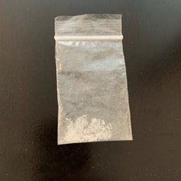 This is a pic of the baggie that was left behind on my driveway.