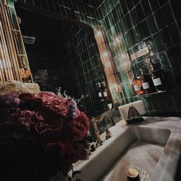 Loved the vibe in the restroom. Nice contrast to the bright and airy main space. This is cozy and luxurious. Loved the vibe in the restroom. Nice contrast to the bright and airy main space. This is cozy and luxurious.