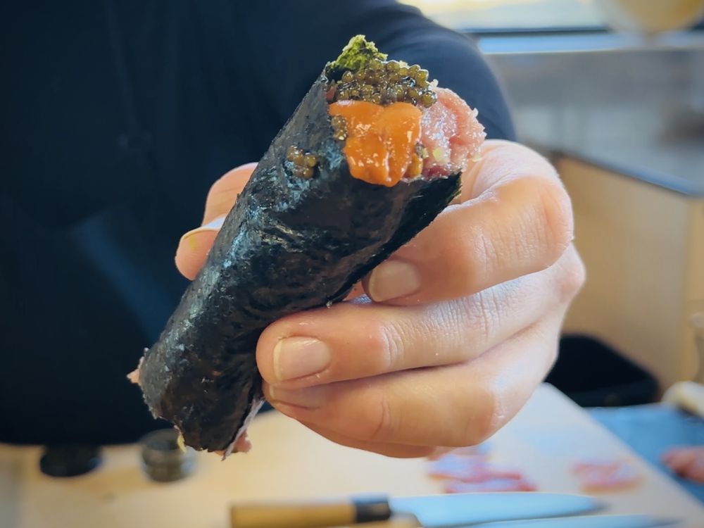 Tani Sushi and Japanese Cuisine Logo