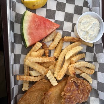 Two Sisters Cafe - Fish and chips with tartar sauce as on the menu, but an additional slice of watermelon not on the menu and not asked for. - American Near Me - Babb, Montana