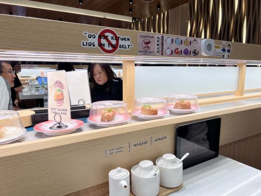 Kura Revolving Sushi Bar by null