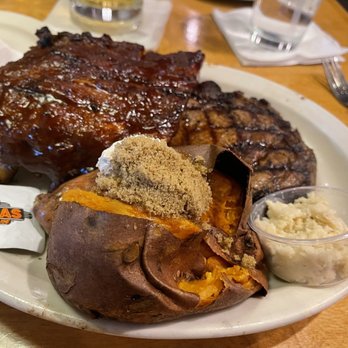 Texas Roadhouse - a plate of food on a table - Steakhouses Near Me - Marana, Arizona Texas Roadhouse - a plate of food on a table - Steakhouses Near Me - Marana, Arizona