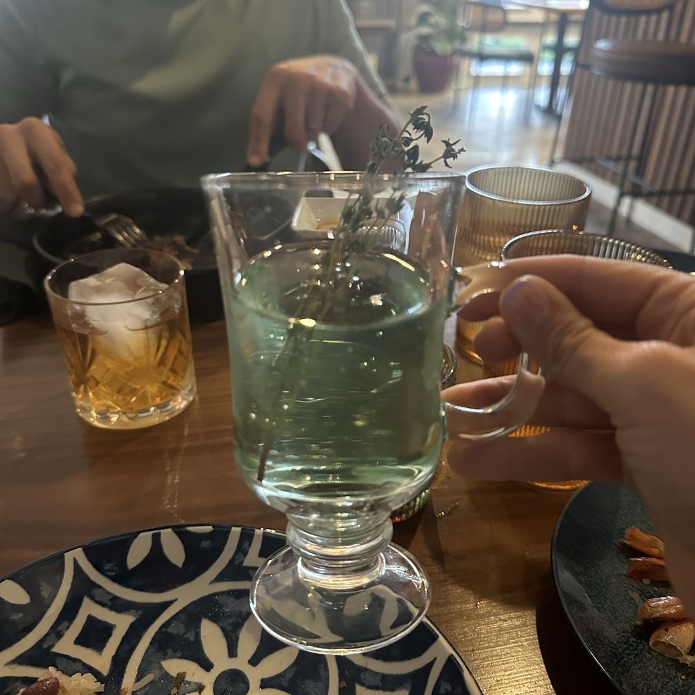 Santana's Kitchen and Cocktails - I asked the bartender to surprise me and it was delicious! Gin based though I forget the name. - Latin American Near Me - Delray Beach, Florida