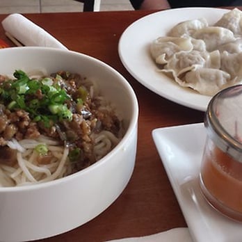 Palace Dumplings - Lamb dumplings, assorted sauces, and noodles with meat sauce and green onion. - Chinese Near Me - Wappingers Falls, New York
