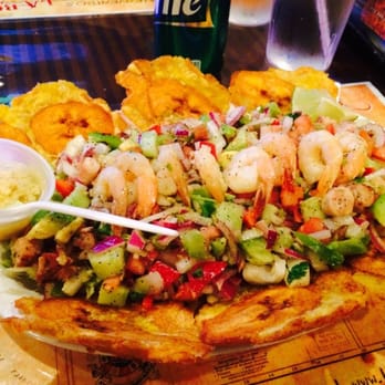 La Bomba - I can't remember the name of this, it's a shrimp and octopus salad with plantains on the side. IT WAS DELICIOUS and healthy! - Puerto Rican Near Me - Chicago, Illinois