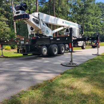 Youngs Tree Tech - Protective crane padding to prevent street and yard damages. - Tree Services Near Me - Raleigh, North Carolina