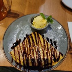 Döner Haus - Shokolade, chocolate filled and drizzled crepe. With a side of ice cream.