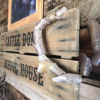 Castle Dome Museum - Broken bottle necks wreath. - Museums Near Me - Yuma, Arizona