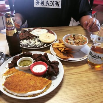 La Taguara - We had Pabellon a Caballo (top left) Cachapa con Queso y Cochino Frito (bottom left) & Rompe Colchon. All were delicious! - Venezuelan Near Me - Madison, Wisconsin La Taguara - We had Pabellon a Caballo (top left) Cachapa con Queso y Cochino Frito (bottom left) & Rompe Colchon. All were delicious! - Venezuelan Near Me - Madison, Wisconsin
