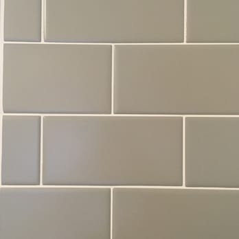 Bella Tile - a closeup of a gray subway tile - Flooring Near Me Bella Tile - a closeup of a gray subway tile - Flooring Near Me