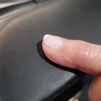 Milano Nail Spa - Middle finger nail showing slappy work done, 1 wk ago - Waxing Near Me - Phoenix, Arizona