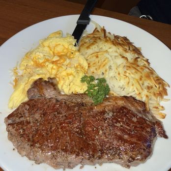 Early Birds Cafe - 10oz New York strip with scramble eggs with cheese and hasbrowns - Breakfast & Brunch Near Me - Fresno, California Early Birds Cafe - 10oz New York strip with scramble eggs with cheese and hasbrowns - Breakfast & Brunch Near Me - Fresno, California