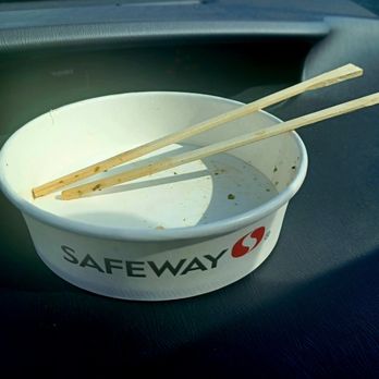 Safeway - This poke bowl of fresh salmon, perfectly cooked rice and furikake is empty because it was so good. It is now all in my belly. - Grocery Near Me - Aiea, Hawaii
