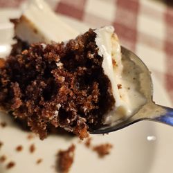 Wildwood Smokehouse of Roanoke - A Spoon holding a piece of the Carrot Cake ready to be tasted and savored.