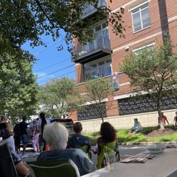 Larchmere PorchFest - A short view of the audience on the street below a balcony performance