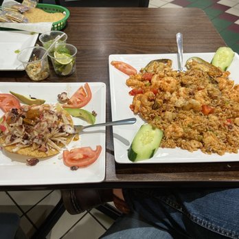 Taqueria Los Magueyes - Paella and mixed seafood tostada - Mexican Near Me - Bridgeview, Illinois Taqueria Los Magueyes - Paella and mixed seafood tostada - Mexican Near Me - Bridgeview, Illinois