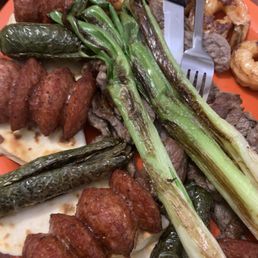 Botana plate - smoked sausage, marinated fajitas, and grilled shrimp, cheese quesadillas, green onions & chiles Botana plate - smoked sausage, marinated fajitas, and grilled shrimp, cheese quesadillas, green onions & chiles