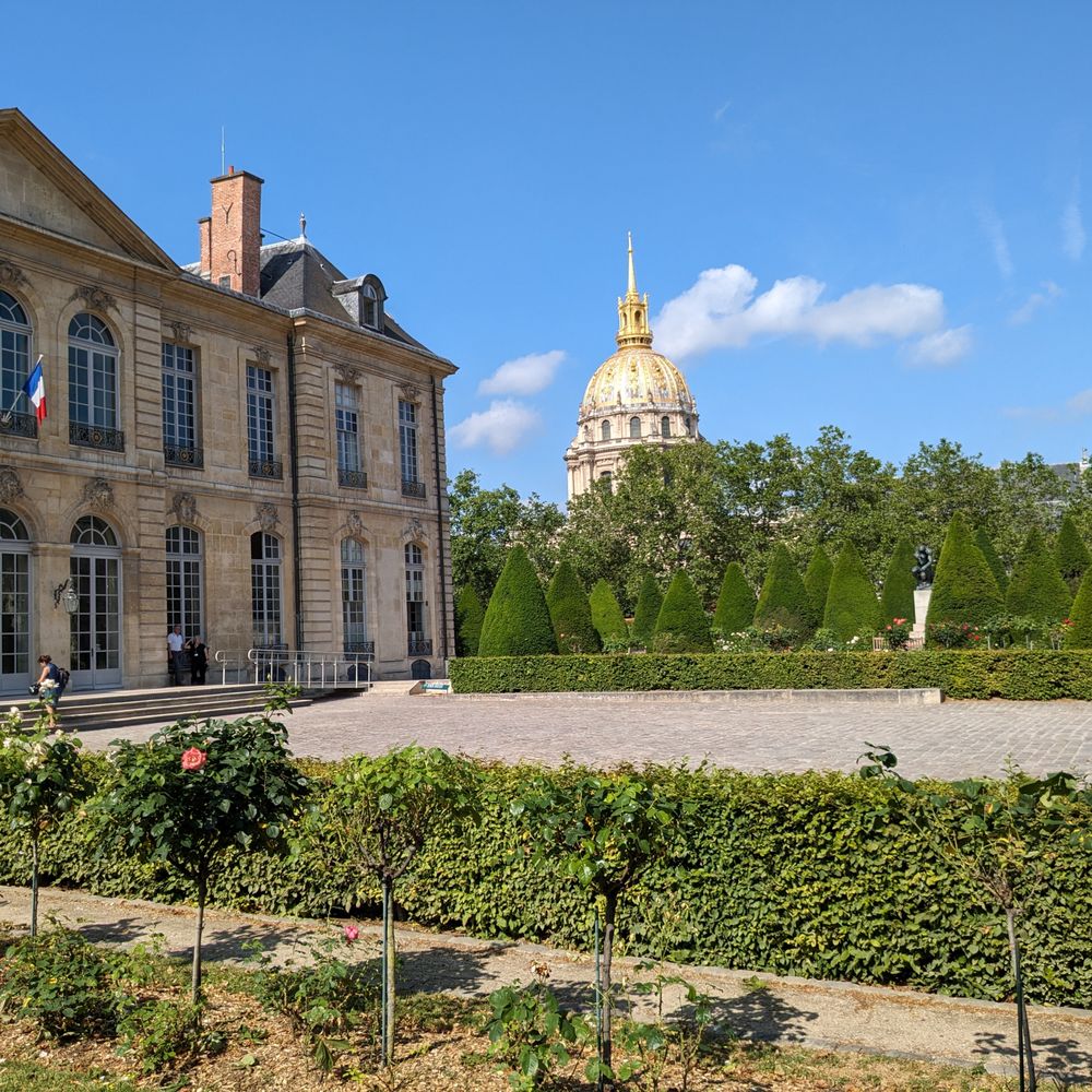 Musée Rodin - Museum building and the gardens. You cam see the Eiffel Tower and the Hôtel des Invalides in the background - Museums Near Me - Paris, 75