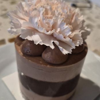 Hinar - Banana chocolate cake..beware when you take off the plastic wrap the entire thing collapses - Cafes Near Me - San Diego, California